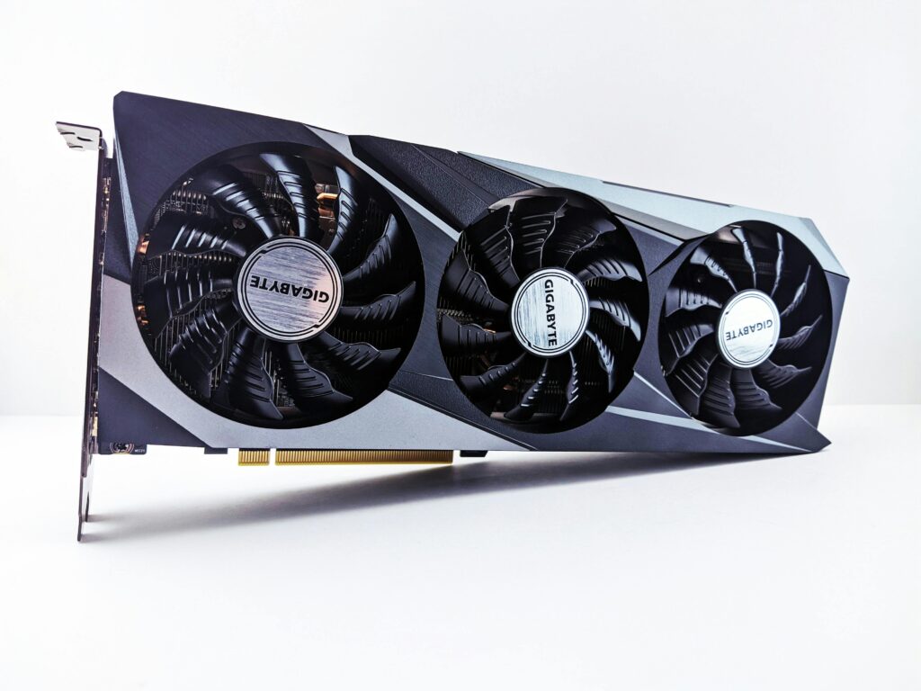 Close-up of a Gigabyte graphics card featuring a sleek design with triple fans.