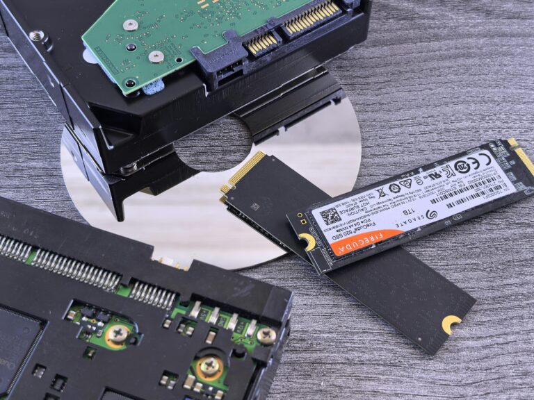 Contrasting data storage technologies: NVMe SSD, HDD, and CD.
