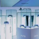 PlayStation 5 consoles and accessories on display in a sleek, futuristic showroom.